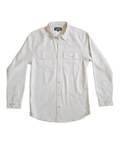 Beige white long-sleeved button-up shirt. It has a classic collar and two chest pockets with button closures. The shirt has a relaxed, casual style with a straight cut. There's a small black label visible at the collar, The Lomas Brand is printed on the tag in white. The shirt is presented flat against a plain white background, giving it a clean, minimalist look. Classic Spring Flannel Shirt For Everyday, Classic Cotton Flannel Shirt, Everyday Relaxed Fit Button-up Shirt, Everyday Shirt With Placket For Fall, Fall Season Everyday Shirt, Classic Relaxed Fit Flannel Shirt, Relaxed Fit Shirt With Button Closure For Everyday, Everyday Cotton Shirt With Buttons, Classic Relaxed Fit Flannel Shirt For Everyday