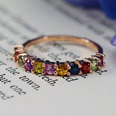 Natural Rainbow Sapphire Band, Sapphire Half Eternity Band, 14k Rose Gold Sapphire Band, Sapphire Wedding Band, Stacking Band, Gift For Her ----------------------------------------------------------------------------------------------------------------------------------------------------------------------------------------------------- ◈ Item Details ◈ Metal : Sterling Silver Metal Purity: 925 Parts Per 1000 Style : Vintage Ring Main Stone : Natural Rainbow Sapphire Stone Size : 2 mm Shape : Rou Wedding Personalization, Elegant Wedding Rings, Rainbow Ring, Sapphire Wedding Band, Rainbow Sapphires, Rainbow Rings, Sapphire Band, Stacking Bands, Sapphire Wedding