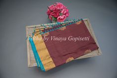 This Brown and Blue Kanchi Soft Silk Saree and Blouse is crafted from luxurious handloom silk for a traditional look and feel. Perfect for weddings and festivals, it's soft and comfortable to wear for all age groups. The beautiful combination of colors makes this saree a chic addition to any wardrobe. The accompanying saree blouse is tailored and embellished with handcrafted dori and tassels at the back. The attention to detail further enhances it and gives the blouse a great finish. Art Silk Blouse Piece With Pallu For Rituals, Diwali Rituals Tussar Silk Blouse Piece, Tussar Silk Saree Blouse Piece For Rituals, Wedding Cotton Silk Traditional Wear With Weaving Work, Wedding Blouse Piece With Weaving Work For Diwali, Wedding Diwali Blouse Piece With Weaving Work, Wedding Saree Blouse Piece With Weaving Work, Silk Handloom Traditional Wear For Rituals, Silk Traditional Wear For Diwali Rituals