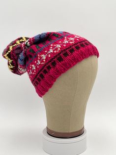 This listing is for a beautiful one-of-a-kind, hand-knit Fair-Isle style hat, size Adult.  It is made from an assortment of high-quality wool, acrylic, cotton and/or nylon worsted-weight yarns from Cascade, Berocco, Lambspride and other quality American and European spinners. Colors are chosen from a stock of over 50 different colors, resulting in a complex combination of color shades and patterns. Each hat is hand-knit using American size 6 (ribbing) and 7 (body) circular needles, resulting in Adjustable Cozy Hats, Cozy Adjustable Hats, Cozy Adjustable One Size Hats, Winter Fitted Knit Hat, Winter Acrylic Hat One Size, One Size Acrylic Winter Hat, Casual Pink Bonnet, One Size Fits All, Casual Pink Bonnet One Size, One Size Pink Casual Bonnet