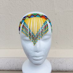 100 % Handmade with fine beads. One size fits most, Beaded Zulu tassel necklace that can also be worn as a head band. The band is multicolored and the tassel has a solid color with a finish of different colors. We have five solid colors for the tassel, Red, Orange, Blue, white and yellow. Made in South Africa, Durban. Zulu Head Beads, Adjustable Bohemian Headband, Beaded Headband For Festivals, Beaded Festival Headband, Festival Beaded Headband, Adjustable Beaded Necklaces With Fringe And Round Beads, Bohemian Beaded Festival Headband, Adjustable Multicolor Festival Headpieces, Adjustable Beaded Bohemian Headpiece