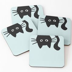 four coasters with black cats on them