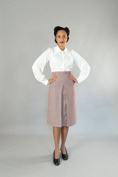 Wide-cut, calf-length skirt with a wide waistband in 40s style. It has a deep box pleat at the front and back. The skirt is lined, All models are made in my studio in Berlin. Outer fabric: 100% virgin wool Dry cleaning Size 34: Bust 80 cm, waist 64 cm, hips 86 cm Size 36: Bust 84 cm, waist 68 cm, hips 90 cm Size 38: Bust 88 cm, waist 72 cm, hips 94 cm Size 40: Bust 92 cm, waist 76 cm, hips 98 cm Size 42: Bust 96 cm, waist 80 cm, hips 102 cm Size 44: Bust 100 cm, waist 84 cm, hips 106 cm Size 46: 40s Skirt, 40 Rocks, 40s Blouse, 40s Style, 40s Dress, Calf Length Skirts, Big Shirt, 40s Fashion, High Quality Dress