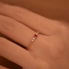 Dainty Ruby Gold Ring, July Birthstone Rings, Ruby Diamond Ring, Red Ruby Stacking Ring, Genuine Ruby Rings, Graduation Ring, Casual Rings We use the highest quality moissanite! Moissanite: ✦ Color: D Colorless ✦ Clarity: VVS1 OR All our diamonds are 100% natural. We use only conflict-free diamonds and gemstones. Diamond: ✦ Color: F-G ✦ Clarity: SI1-VS ✦PRODUCT DETAILS✦ → center stone: natural ruby → accent stone: diamonds Also available in other colored gemstones upon request. Please get in tou Lab-created Ruby Ring With Diamond Accents As Gift, Lab-created Ruby Rings With Diamond Accents For Gift, Gift Ring With Diamond Accents And Lab-created Ruby, Gift Rings With Diamond Accents And Lab-created Ruby, Ruby Rings With Diamond Accents For Gift, Ruby Rings With Diamond Accents For Promise, Red Birthstone Ring With Accent Stones For Promise, Elegant Red Gemstone Stackable Rings, Elegant Red Promise Stackable Rings