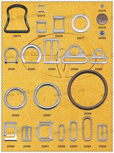 an assortment of metal parts on a yellow background