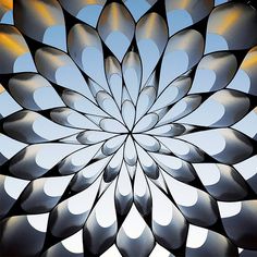 an image of a large flower that is in the middle of some sort of art