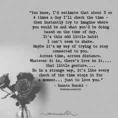 a vase filled with roses sitting on top of a table next to a poem written in black and white