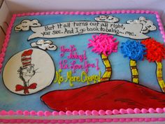 a dr seuss birthday cake with the cat in the hat on it's side