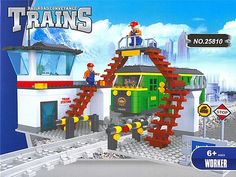 the lego train is set to be built with people on it's roof and ladders