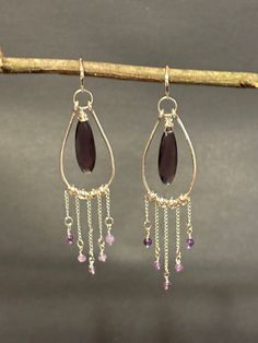 Artisan designed and handcrafted one of a kind chandelier earrings with sterling silver Wire Wrapped teardrop faceted Amethyst, Hammered Sterling Silver Hoop and chains dangling from bottom of the hand forged teardrop hoop with 4 mm amethyst beads Chandelier Earrings.  These colorful earrings well brighten your mood and make you feel cheer! The purple amethyst with dazzling sparkling are dangling on sterling silver chain to create these beautiful long dangle earrings. Total measurement length 4 Beaded Chandelier Earrings, Earring Wire, Beaded Chandelier, Sterling Silver Wire Wrap, Hammered Sterling Silver, Long Dangle Earrings, Colorful Earrings, Amethyst Beads, Sterling Silver Hoops