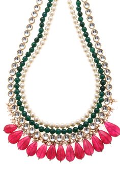 Red Green Gold plated Indian Necklace featuring glass kundan work, pearl embellishments with green onyx stones and plated with 22kt gold. This pretty necklace are a perfect match to all things pastels. Perfect to wear to dinner, and perfect gift for family members, friends or bridesmaid. LENGTH Earrings Length - 26 inches DETAILS -100% top Quality Faux Glass Polki -22K gold and silver Plated silver copper alloy. -Handcrafted in our all girls workshop in Paisley Pop Studio, Jammu and Kashmir STYL Green Pearl Chain Necklace For Celebration, Festive Green Beaded Necklace With Pearl Chain, Diwali Green Jeweled Necklaces, Green Onyx Stone, Stone Necklace Set, Kundan Work, Stones Necklace, Pretty Necklace, Indian Necklace