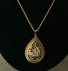 Beautiful gold chain and elegant ALLAH'S pendent and amazing multi stone handwork perfect Islamic jewelry lovers. Gold Plated Gemstone Chain Necklace Gift, Ornate Pendant Necklace With Jewels, Spiritual Jewel Pendant Necklace, Ornate Jewel Pendant Necklace, Spiritual Gold Teardrop Pendant Necklace, Spiritual Pendant Necklace With Jewels, Ornate Jeweled Pendant Jewelry, Costume Jewelry Pendant Necklace For Gift, Ornate Gold Necklace With Large Pendant