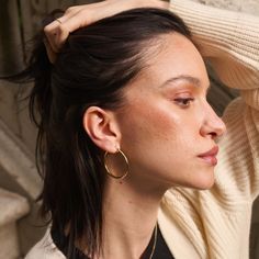 We combined a classic, pared-down aesthetic with 14k solid gold to create our timeless Tube Hoop Earrings. Made with forever in mind, these ultra-lightweight hoops are forged from solid gold (not plated or filled), which means they’ll never tarnish. Wear them all day, every day — they suit any situation. Classic 14k Gold Filled Hoop Earrings For Everyday Luxury, Classic Small Hoop Earrings In 14k Gold Filled, Minimalist Hypoallergenic Hoop Earrings For Everyday, Timeless 14k Gold Hypoallergenic Hoop Earrings, Classic 14k Gold Hoop Earrings For Everyday, Timeless Yellow Gold Hoop Earrings For Everyday, Timeless Hypoallergenic Huggie Hoop Earrings, Timeless Hoop Jewelry For Everyday, Timeless Everyday Hoop Jewelry