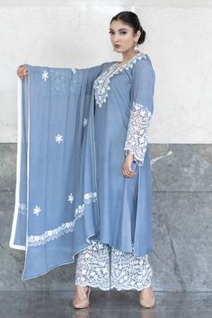 Blue Cotton Silk Churidar With Dabka Work, Designer Cotton Palazzo Set With Intricate Embroidery, Blue Chikankari Embroidery Cotton Silk Salwar Kameez, Blue Palazzo Set With Intricate Embroidery, Blue Palazzo Set With Intricate Embroidery And Long Sleeves, Bollywood Style Blue Chikankari Embroidered Palazzo Set, Blue Bollywood Palazzo Set With Chikankari Embroidery, Blue Long Sleeve Palazzo Set With Intricate Embroidery, Blue Mulmul Designer Churidar