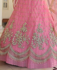 COLOR : Shimmering Blush Pink FABRIC : Top (Blouse) - Soft Net, Bottom (Lehenga) - Soft Net, Dupatta - Soft Net WORK : Heavy Metallic Thread Embroidery, Zari Work, Cutwork, Sequins, Motifs, Lace Border OCCASION : Wedding, Reception, Sangeet, Engagement READY-TO-WEAR : NoSTITCHING : Available as semi-stitched fabric, can be stitched using standard size option (+$30). Note: There might be a slight color variation due to lighting and flash used during photoshoot. The bright shade seen is the best c Net Embroidery Blouse, Blush Pink Fabric, Handwork Blouse, Net Embroidery, Holiday Promotions, Cutwork Embroidery, Embroidered Wedding, Net Dupatta, Zari Work