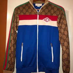 Blue, Red And White Intarsia With Green And Red Down Sleeves. Gucci Logo On Chest. Purchased Brand New At Gucci In Rome, Italy. Worn Twice. Immaculate Condition. Rare. Original Box, Tags, Bags Included. Have Original Receipt For Authenticity. Casual Fitted Gucci Outerwear, Gucci Multicolor Outerwear For Fall, Gucci Casual Track Jacket For Winter, Gucci Long Sleeve Track Jacket For Fall, Red Gucci Outerwear For Fall, Casual Gucci Winter Track Jacket, Gucci Casual Winter Track Jacket, Gucci Long Sleeve Track Jacket For Winter, Casual Blue Gucci Outerwear