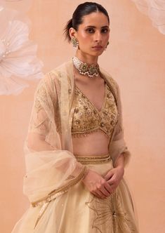 V neck blouse embellished with intricate zardozi floral motifs and paired with big floral motifs on skirt with dupatta. Pre Bridal, Lehenga Pattern, White Lehenga, Lehenga Red, Organza Lehenga, Padded Blouse, Indian Wedding Wear, Elegant Sets, Silk Organza