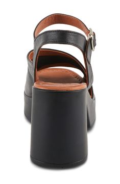 An asymmetric topline lends modern dimension to a rich leather sandal lifted by a modest platform and chunky block heel. 3 1/4" heel; 1" platform Adjustable ankle strap with buckle closure Leather upper and lining/synthetic sole Made in Turkey Leather Block Heel Sandals With Heel Strap, Modern Slingback Sandals With Wedge Heel, Modern Platform Block Heels With Open Toe, Modern Leather Heels With Chunky Platform, Modern Chunky Platform Leather Heels, Modern Wedge Sandals With Buckle Closure And Block Heel, Modern Wedge Sandals With Platform And Block Heel, Modern Slingback Sandals With Block Heel And Heel Loop, Modern Wedge Sandals With Platform And Open Heel