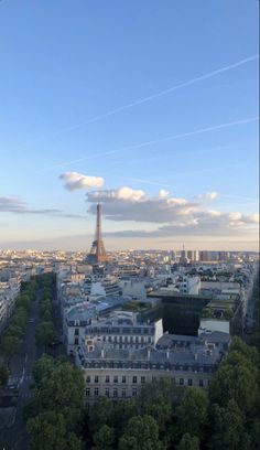 the eiffel tower towering over the city of paris, france as seen from above