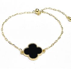 Brand New Gold And Black Metal Clover Chain Bracelet Trendy Black Chain Bracelet, Black Dainty Metal Jewelry, Dainty Black Metal Jewelry, Trendy Black Jewelry With Gold Chain, Trendy Black Chain Bracelet Gift, Elegant Black Chain Bracelets, Elegant Black Chain Bracelet, Elegant Black Chain Bracelet As Gift, Black Charm Bracelet With Adjustable Chain