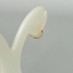 12mm sterling silver endless ear hoops, dipped in gold. Size: 1.5 x 12 mm These earrings are made of real 925 hypoallergenic sterling silver, dipped in real gold. Will be packaged in a gift box. Please let me know if you don't want it in one. I can write out a message from you to the receiver if needed. Please be free to contact me at... bhavnakwintra1956@gmail.com More hoops: https://www.etsy.com/your/shops/TheSilverGame/tools/listings/section:26305414 More earrings: https://www.etsy.com/your/s Simple Tiny Hoop Huggie Earrings, Simple Tiny Huggie Hoop Earrings, Dainty Small Hoop Single Huggie Earring, White Minimalist Huggie Hoop Earrings, Simple Huggie Cartilage Earrings With Ear Wire, Simple Adjustable Gold Cartilage Earrings, Simple Hypoallergenic Small Hoop Huggie Earrings, White Hoop Nose Rings Gift, Simple Huggie Hoop Earrings With Ear Wire