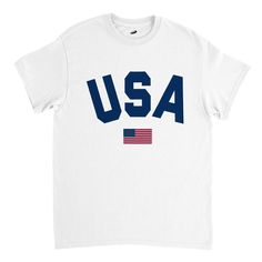 "Premium heavy cotton classic fit T-shirt with a great and letter graphic (\"USA\") and the flag of the United States of America on the front. Comfortable shirt for both men and women. Relaxed and regular fit. This versatile shirt is perfect for various occasions, whether you're attending a 4th of July celebration, supporting your favorite sports team or simply wanting to exhibit your love for the USA. Very nice gift idea for people whose heart truly lies for the USA - the land of the free and the home of the brave! Designed with ❤️ in California (USA)/England (UK) and produced fairly. Fabric details .: Heavy fabric (5.3 oz/yd² (180 g/m .: Solid colors are 100% cotton .: Seamless double-needle collar .: Double-needle sleeve and bottom hems .: 100% combed and ring-spun cotton .: Taped neck Sporty Cotton T-shirt With Flag Print, Made In Usa Crew Neck T-shirt For Veterans Day, Cotton Sports T-shirt With Flag Print, 4th Of July Streetwear T-shirt With Letter Print, American Style Pre-shrunk Cotton T-shirt, Cotton Crew Neck T-shirt With Flag Print, American Flag Cotton T-shirt For 4th Of July, Memorial Day Cotton Crew Neck T-shirt, Cotton T-shirt Made In Usa For Streetwear