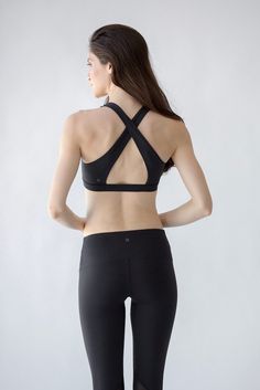 Compressive Cross Back Sports Bra With Built-in Bra, Supportive Cross Back Sports Bra With Built-in Padding, Strappy Back Sports Bra With Built-in Padding For Yoga, Versatile Compression Sports Bra With Built-in Bra, Compressive Activewear With Built-in Bra And Cross Back, Cross Back Sports Bra For Yoga, Fitted Bra With Removable Pads For Pilates, Sporty Cross Back Bra For Workout, Sporty Workout Bra With Cross Back