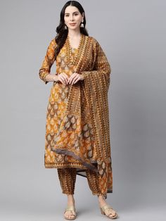 Ethnic Motifs Printed Thread Work Pure Cotton Straight Kurta Set PRODUCT DETAILS  Mustard yellow, blue & white printed Kurta with Palazzos with dupatta Kurta design: Ethnic motifs printed Straight shape Regular style V-neck, three-quarter regular sleeves Na pockets thread work detail Calf length length with straight hem Pure cotton knitted and woven fabric Palazzos design: Printed Palazzos Elasticated waistband Drawstring closure Size & Fit The model (height 5'8) is wearing a size S Material & C Yellow Bollywood Kurta With Printed Motifs, Navratri Yellow Palazzo Set With Printed Motifs, Yellow Palazzo Set With Printed Motifs For Navratri, Yellow Chanderi Palazzo Set With Printed Motifs, Yellow Anarkali Set With Traditional Drape And Printed Motifs, Yellow Traditional Wear With Printed Motifs, Straight Kurta, Yellow Traditional Wear Straight Kurta With Printed Motifs, Yellow Semi-stitched Kurta With Printed Motifs, Semi-stitched Yellow Kurta With Printed Motifs