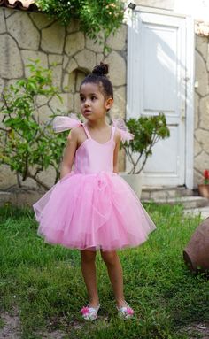 Girls pink dress, birthday party, wedding, tulle princess dress, glitter dress, flower girl dress. Pink dress suitable for girls 1-6 years old. For birthday parties, weddings and all your special occasions. This dress for girls is very comfortable. It is made of satin bodice to make the dress look more luxurious. High quality satin that gives the dress a shiny, durable and crease resistant look. Satin lining is used in the dress. The glitters may shed a little. If your little princess escapes from the party, you can find her by following the spilled glitters  Please refer to the size chart when ordering. Dress lengths (from shoulder to knee): 1 year 43 cm, 2 years 48 cm. 3 years 52cm, 4 years 56cm, 5 years 61cm, 6 years 65cm. If you contact us, we can make the hemline to any length you wan Pink Princess Fairy Dress For Pageant, Pink Princess Dress With Tulle Skirt For Pageants, Pink Princess Pageant Dress With Tulle Skirt, Pink Tulle Ball Gown For Dress-up, Pink Tulle Ball Gown For Dress-up Events, Pink Tulle Skirt Ball Gown For Dress-up Events, Fairy Style Pink Princess Wedding Dress, Pink Princess Fairy Dress For Dress-up, Princess Style Tulle Bridesmaid Pageant Dress