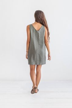 "DESCRIPTION: ♥ 100% natural European linen; ♥ safe Oeko-TEX® Standard 100 certified linen fabric ♥ softened midweight linen (185 g/m2) ♥ sleeveless dress ♥ v neckline FIT ♥ length from the lower to the upper seam is about 33.5 inches / 85 cm ♥ measurements taken from a size S ♥ model is 170 cm and wearing a size S SIZE CHART: XS: Bust 30.7\"- 32.7\" (78-83 cm) , Waist 23.6\"- 25.6\" (60-65 cm), Hips 33.5\"- 35\" (85-89 cm) S: Bust 33\"- 35\" (84-89 cm) , Waist 26\"- 28\" (66-71 cm), Hips 35.5\" Casual Linen Mini Dress For Summer, Casual Mini Linen Dress, Linen V-neck Mini Dress For Vacation, Summer Linen V-neck Dress, Summer Linen V-neck Sundress, Casual Linen V-neck Mini Dress, Linen V-neck Sleeveless Sundress, Casual Linen Mini Dress, Green V-neck Linen Dress