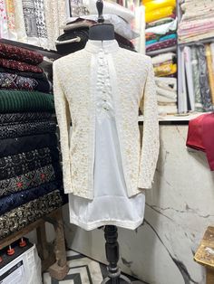 *3 Piece  White ,  Kurta, Pant, and Jacket  *Fabric: %100 Georgette, Satin, Thick, Warm, Comfortable, Breathable, Softer, Satin Feeling *Center Open  Jacket ,  With Zipper Fly Pants. *This Suit Has A 6" Drop Which Is The Difference Between The Size Of The Sherwani & Pants. For Example, A 40r Jacket Includes A 34W Pant *Dry Clean Only Important Note: All Our Products Are Made To Order ! Please Contact Us For Perfect Fitting Suit. .Full Lining Shrugs With Padding *We are proud to offer a wide rang Beige Long Sleeve Semi-formal Set, Fitted White Embroidered Bandhgala, White Fitted Embroidered Bandhgala, White Embroidered Fitted Bandhgala, Fitted White Suit For Festive Occasions, Off White Long Sleeve Bandhgala With Dabka, White Fitted Nehru Jacket For Semi-formal Occasions, Festive White Fitted Suit, White Embroidered Sets For Formal Occasions