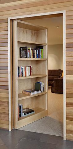 an image of a computer screen with bookshelves in the room and on the wall