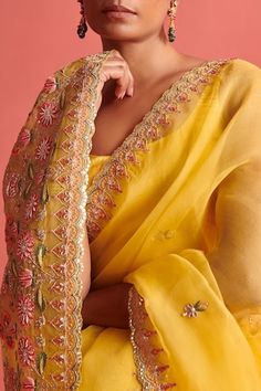 Yellow hand embroidered organza saree with mix of french knots and dabka work in tulip floral jaal pattern on pallu and border. Paired with a sleeveless matching mashru silk padded blouse and petticoat. - Aza Fashions Fitted Organza Pre-draped Saree With Gota Work, Pre-draped Organza Saree With Gota Work, Anarkali Pre-draped Saree With Gota Work, Festive Organza Pre-draped Saree With Gota Work, Organza Blouse With Dori Work, Organza Blouse Piece With Dori Work, Fitted Tissue Silk Saree With Gota Work, Transitional Organza Saree With Dori Work, Festive Pre-draped Saree In Organza With Gota Work