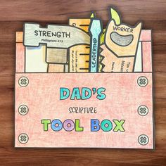 a father's descriptive tool box with scissors and pencils