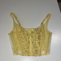 Victoria Secret Bustier Lingerie Corset Top Marked Small New With Tags Yellow Hook Eye Shop Policies Must Be Read Before Purchasing! By Purchasing You Have Agreed To These Terms On My Page Or Linked Here Https://Depop.App.Link/Ppojjjf2cdb #Bustier #Vs #Victoriasecret #Lace #Corset Coquette Lace Corset With Underwire, Coquette Lace Underwire Corset, Lace Coquette Underwire Corset, Lace Underwire Coquette Corset, Summer Lace Corset, Bra Friendly, Summer Lace Corset With Bra Friendly Design, Summer Lace Corset Bra Friendly, Coquette Fitted Lace Bra, Fitted Lace Bra In Coquette Style