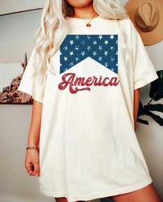 America Shirt. Printed on Comfort Colors Tee. Must size up for oversized look. See size chart for measurements. Comfort Colors® 1717 Medium fabric (6.1 oz/yd² (206.8 g/m²)) Relaxed fit Sewn-in twill label 100% ring-spun cotton Gildan is back with its garment-dyed t-shirt, a fully customizable tee made 100% with ring-spun cotton. Care instructions Machine wash: cold (max 30C or 90F); Do not bleach; Tumble dry: low heat; Iron, steam or dry: low heat; Do not dry clean. ★SHIPPING TIMES All of our de Summer Cotton Shirt With Logo Print, 4th Of July Cotton T-shirt With Text Print, Casual Crew Neck Shirt Made In Usa, Casual Oversized Tops For 4th Of July, Crew Neck Cotton Shirt Made In Usa, Oversized Casual Tops For 4th Of July, Oversized Crew Neck Tops For 4th Of July, Cotton Crew Neck Shirt Made In Usa, Relaxed Fit Graphic Tee Made In Usa