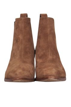 Every fashionista needs a chic pair of booties in their closet, so grab these ones from Rag & Bone before they're gone! With soft suede in a neutral camel hue, these heeled beauties are the ultimate fall staple. Whether you're headed to an apple orchard or a haunted house, style these with jeans and a flannel, grab a pumpkin spice latte and you'll be good to go! Size 5 Suede upper Slip on Short shaft Round toe Stacked heel Leather sole and footbed w/ some wear Original box included Heel 2" Brown Suede Booties For Fall, Casual Camel Boots For Fall, Brown Booties With Suede Lining For Fall, Winter Suede Booties With Almond Toe, Brown Suede Ankle-high Booties, Brown Suede Chelsea Boots For Fall, Chic Brown Suede Chelsea Boots, Brown Suede Booties With Stacked Heel, Brown Suede Booties With Suede Lining