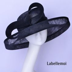 Large up turned brim sinamay hat with big bow Brim width:14cm+4cm(the up turned part is 4cm) Head size: 57cm also with elastic to adjust it to be smaller Ideal for wedding/party/races/church It is handmade product and every hat is well inspected before shipment,no return accepted.But please do contact us if you have any problems on your order.Thanks for your supports. Brimmed Sinamay Fascinator For Church, Wide Brim Party Hat With Bow, Black Sinamay Fascinator For Summer, Black Sinamay Hats For Races, Evening Boater Hat With Short Brim In Sinamay, Black Sinamay Hats With Curved Brim, Adjustable Sinamay Boater Hat For Evening, Evening Adjustable Sinamay Boater Hat, Black Sinamay Fascinator For Kentucky Derby