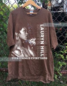 Lauryn Hill Everything is everything T-Shirt, 90's Lauryn Hill T-shirt, Retro Music  gift for men women unisex t-shirt : 100% Cotton (fiber content may vary for different colors) .: Medium fabric (5.3 oz/yd² (180 g/m .: Classic fit .: Runs true to size HOW TO ORDER Pick you favorite design. Review the size & color charts above FIRST and then select shirt size and color from the dropdown menu. Indicate the birthday year in the personalization box. Please note size measurements for t-shirts may differ +/- 1 inch due to the manufacturer. Colors may not exactly match what's shown on screen. Thanks for stopping by my shop. Feel free to reach out for any questions you may have. I appreciate your business. Streetwear Fashion Women Graphic Tees, 90s Rappers Outfit Women, 90s Sitcoms Fashion, Lauryn Hill Concert Outfit Ideas, Lauryn Hill Shirt, Cute Cheap Shirts, Everything Is Everything, Vintage Shirt Design, Music T Shirt