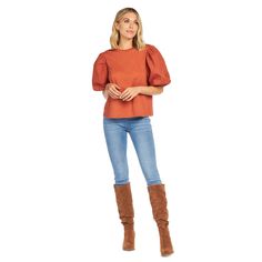 The Aurora Rust Puff-Sleeve Top is effortlessly stylish. The cotton jersey top features cotton poplin balloon short sleeves. The top measures approximately 23" from shoulder to hem on size small. The dramatic sleeves add a stylish touch to this classic top, available in black, rust and cream. | Mud Pie Women's Aurora Rust Puff-Sleeve Top in Orange, Size Large | 100% Cotton Modern Puff Sleeve Blouse For Spring, Modern Puff Sleeve Blouse For Fall, Spring Pleated Puff Sleeve Top, Cotton Padded Lantern Sleeve Top, Chic Puff Sleeve Top For Work In Fall, Chic Puff Sleeve Top For Work During Fall, Chic Puff Sleeve Top For Casual Gatherings, Casual Cotton Puff Sleeve Padded Top, Fall Short Sleeve Blouse With Pleated Sleeves