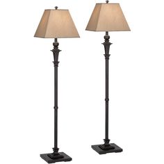 two lamps with shades on each floor