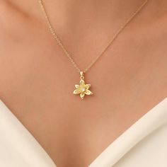 This elegant gold flower pendant necklace features a delicate,  design that adds a touch of sophistication to any outfit. Crafted from high-quality materials, it offers both beauty and durability, perfect for any occasion. Measurements: Pendant:21x18mm Chain: 14/16/18/20/22inch.All necklaces come with 2inch extender chain! All jewelry comes in a soft velvet pouch ready for gift. Materials: Gold over brass Quality promise Our jewelry is crafted with  attention to detail, offering both beauty and Elegant Rose Gold Flower Charm Necklaces, Elegant Rose Gold Flower Charm Necklace, Gold Plated Jewelry With Flower Charm, Elegant Flower Charm Necklace With Clavicle Chain, Elegant Flower Shape Charm Necklace With Clavicle Chain, Flower Pendant Charm Necklaces For Weddings, Elegant Gold Plated Flower Charm Necklace, Gift Flower Necklace With Clavicle Chain, Elegant Gold Plated Necklace With Flower Charm