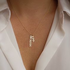 The London Name Necklace is the perfect accessory to express your unique style! Inspired by the classic style of London, this necklace features one customizable name pendant, and if you're feeling extra fun, you can add more! Add a special date, your initials, your favorite word - the possibilities are endless. NECKLACE FEATURES Choice of: 18k gold plating over sterling silver or Sterling Silver handcrafted custom name pendant (measures approx. 1") Choice of Chain Metal: Gold Filled or Sterling Pendant With Names, Name Brand Jewelry, Special Necklace Unique, Custom Necklace Names, Personalized Necklace Names, Name Pendant Gold, Best Necklace, Name Chain, Date Necklace