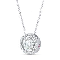 This elegant pendant showcases a stunning 1-carat round cut diamond, beautifully encircled by 22 smaller round diamonds totaling 1 1/4 carats. Set in 14k gold, the pendant is suspended on a non-removable chain, creating a seamless blend of sophistication and sparkle, perfect for any special occasion. NECKLACE DETAILS 14K Gold Chain is not removeable 1.5mm round genuine Ruby accent DIAMOND DETAILS Lab Grown Diamonds: 1.21 tcw Diamond Quantity: 23 Diamond Color: G Diamond Clarity: VS Setting: Prong Certification: IGL Certified Dazzling White Solitaire Round Pendant Necklace, White Solitaire Necklace With Diamond Accents And Round Pendant, White Brilliant Cut Diamond Necklace With Oval Pendant, White Solitaire Necklace With Diamond Cut Round Pendant, White Brilliant Cut Oval Pendant Diamond Necklace, Dazzling Round Diamond Necklace With Halo Design, Dazzling Round Pendant Diamond Necklace With Halo Design, Dazzling Diamond Necklace With Halo Design And Round Pendant, Diamond White Necklace With Halo Pendant