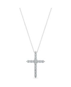 As radiant as your faith, this exquisite cross pendant necklace is skillfully crafted with brilliant round-cut diamonds. Macy's Diamond Necklace With Prong Setting, Macy's White Diamond Necklaces, Macy's Diamond Cut Necklace In Diamond White, Macy's White Gold Necklace With Brilliant Cut, Macy's Diamond Cut Diamond White Necklace, Macy's Diamond White Diamond Cut Necklace, Macy's Brilliant Cut White Gold Necklace, Macy's Fine Jewelry White Necklace, Macy's Diamond Necklace In White Gold And Sterling Silver