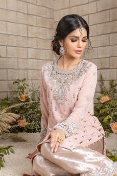 Blush Pink long silhouette shirt beautifully embellished with kamdani motives all over, cut work stylish zardozi work neckline & sleeves featuring silver dabka, sequins, pearls, beads, resham & tila embroidery, paired with pure atlas jamawar scalloped hand worked culottes & heavily kamdani embellished dupatta must have for engagement, nikkah and other Wedding Festivities Shirt Fabric: Georgette Shirt Length: 48” (customisable, mention in order notes) Culotte Fabric: Pure Atlas Jamawar Dupatta Fa Anarkali Hand Embellished Chinon Kurta, Unstitched Hand Embellished Chinon Salwar Kameez, Unstitched Party Wear Salwar Kameez Hand Embellished, Unstitched Hand-embellished Salwar Kameez For Party, Party Wear Hand Embellished Kurta For Eid, Bollywood Style Hand Embellished Straight Salwar Kameez, Party Wear Semi-stitched Hand Embellished Salwar Kameez, Hand Embellished Straight Kurta Salwar Kameez For Designer Wear, Party Wear Hand Embellished Semi-stitched Salwar Kameez