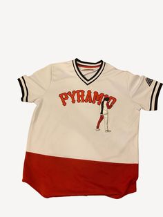 A classic white and red unique vintage baseball jersey. Black Pyramid design with a black sleeve trim. Retro style sports jersey with a graffiti spray paint design. Sleek straight baseball jersey style with a comfy fabric.  Fits 49'' around the chest Retro Baseball Jersey, White Varsity T-shirt For Streetwear, Red Baseball Collar Jersey For Game Day, White Jersey With Letter Print For Baseball Season, White College Jersey With Letter Print, College White Jersey With Letter Print, White Sports Jersey With Graphic Print, White Short Sleeve Varsity Jersey, White Baseball Jersey With Letter Print For Game Day