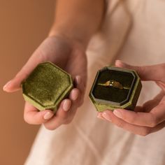 V E L V E T ∙ R I N G ∙ B O X Make the perfect gift even more special by putting a little extra thought into the presentation. The texture of our Velvet Ring Box is soft and unique, perfect for holding your meaningful jewelry pieces and celebrating a cherished moment - available in neutral colors that really make your jewelry pop. * Made of soft velvet in a variety of colors * Dimensions: 2x2 Inches, 1.75 Inches tall * Our Ring Case is compact enough to fit in your luggage wherever you go while Velvet Green Ring Box, Velvet Ring Box Wedding Green, Suede Ring Box, Velvet Ring Box Wedding, Caitlyn Minimalist, Dainty Engagement, Velvet Ring, Jewelry Holders, Velvet Ring Box