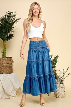 THIS ITEM IS FINAL SALE 32"Slay your style game with the Shelby May 3 Button Tiered Denim Maxi Skirt! This maxi skirt features pleats for a flowy fit and side pockets for storing all your goodies. And with its exposed button closures, you'll be looking fabulously fierce in no time. Take on the world in this skirt - it's 100% cotton cuteness Measurement Guide Small-Width 28" Length 37" Medium- Width 30" Length 37" Large- Width 32" Length 37" Dark Wash Button Skirt For Summer, High Waist Maxi Skirt With Button Closure For Summer, Tiered Denim Skirt With Pockets For Summer, Casual Fitted Maxi Skirt With Button Closure, Flared Skirt Bottoms With Button Closure For Spring, Flared Skirt With Button Closure For Spring, Spring Flared Skirt With Button Closure, Spring Long Skirt With Buttons, Flowy Denim Tiered Skirt