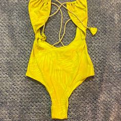 Rare And Vintage H&M Monokini. From 10 Years Ago. Sold Out Everywhere. Rope Fixtures And Tie Clothes. Stretchy Material. Good Hardware. Size 4. Modeled On Myself. It’s Clearly Too Small For Me! Lol Never Worn But No Tags Yellow Backless Swimwear For Party, Yellow Fitted Backless Swimwear, Fitted Yellow Backless Swimwear, Yellow One-piece Swimwear For Pool, Yellow Backless Swimwear For Poolside, Yellow Backless Swimwear For Sunbathing, Yellow Backless Swimwear For Spring, Yellow Triangle Top Swimwear For Vacation, Yellow Triangle Top Swimwear With Stretch